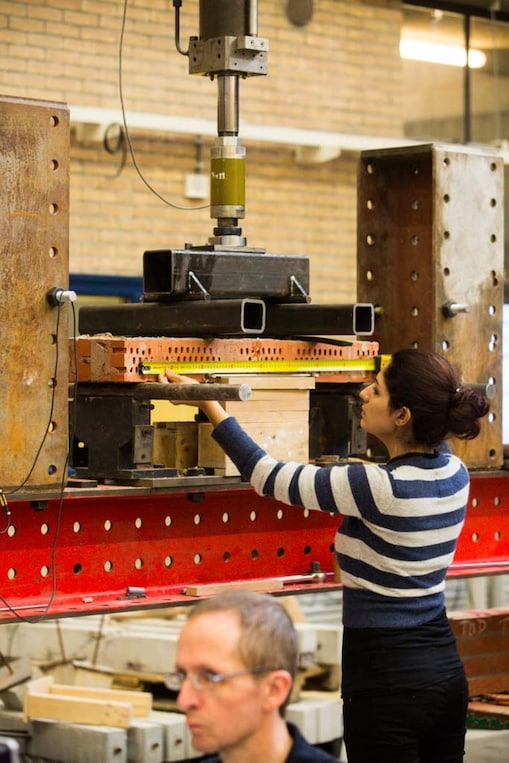 Women measuring the machine