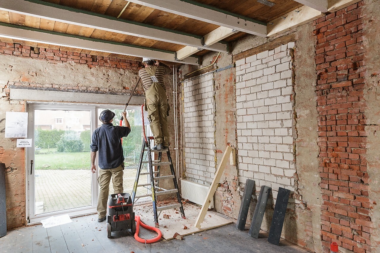 Man reconstruction the home